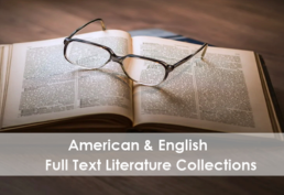 an open book with glasses on top